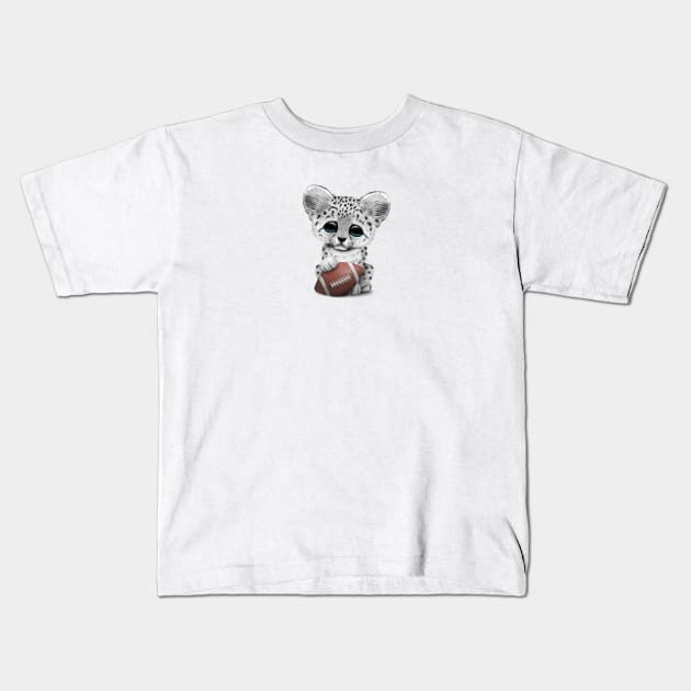 Snow Leopard Cub Playing With Football Kids T-Shirt by jeffbartels